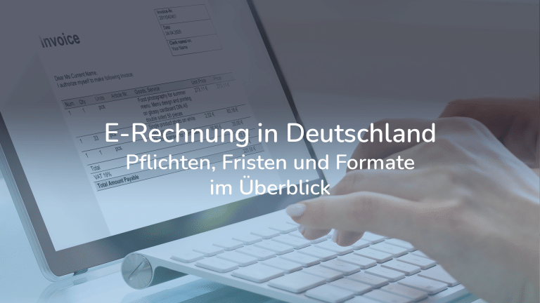 Bildschirm zeigt E-Rechnung davor eine Tastatur auf der Hände liegen und tippen.